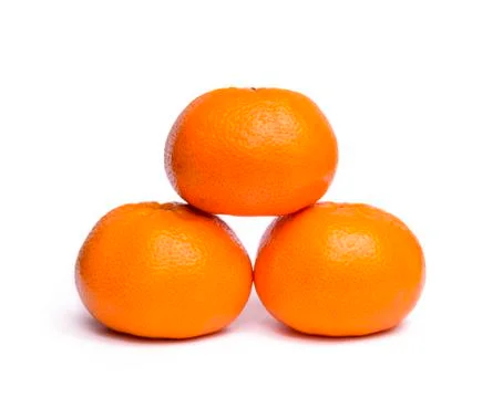 Three orange fruit Stock Photos
