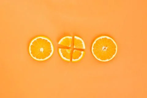 Three orange slices. High quality and resolution beautiful photo concept Stock Photos