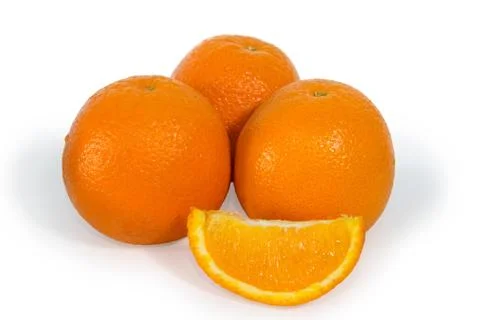 Three oranges and slice isolated Stock Photos