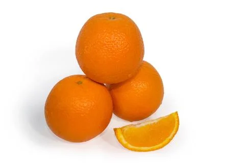Three oranges and slice isolated Stock Photos