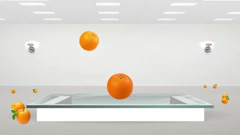 Three oranges fall on the table Stock Footage 153741053
