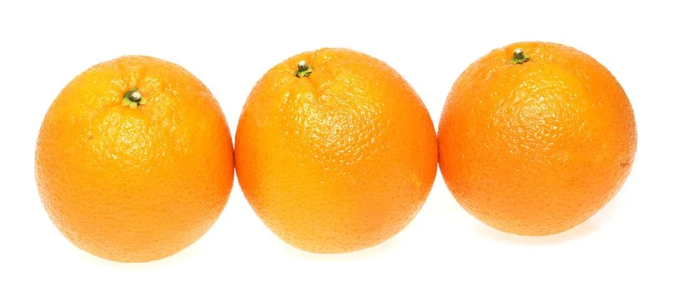 Three oranges on white background Stock Photos