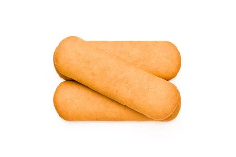 Three overlapping golden biscuits isolated on a white studio background Stock Photos