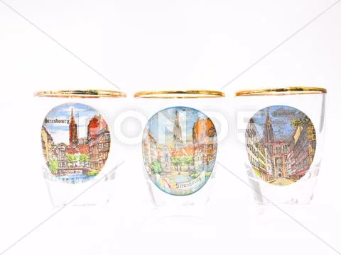 Three packe shot glasses of strasbourg landmark isolated on white background Stock Photos