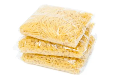 Three packets of pasta Stock Photos