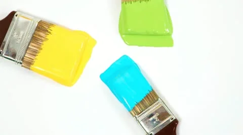 Three paint brushes with wet paint. Stock Footage 21299860