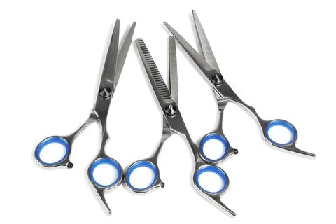 Three Pairs of Barber Scissors Stock Photos