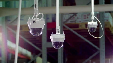 Three panoramic cameras suspend from ceiling in warehouse Stock Footage 238767455
