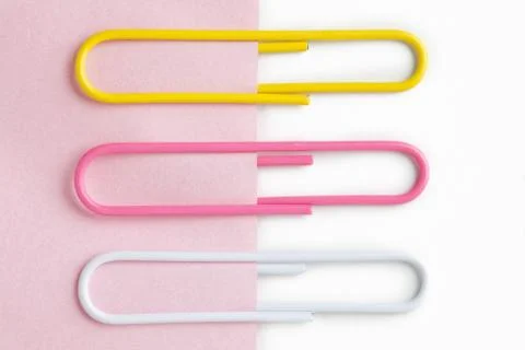 Three paper clips on note Stock Photos