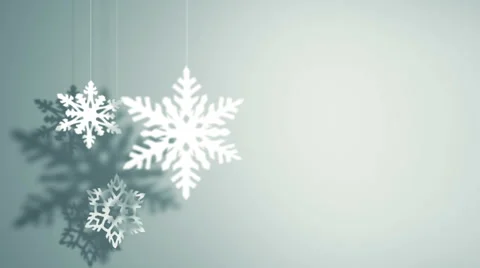 Three paper snowflakes hanging and rotating decoration Stock Footage 44193363