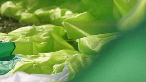 Three Parachute lying on the ground Stock Footage 76005992