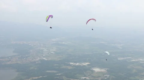Three paragliders flying Stock Footage 59944880
