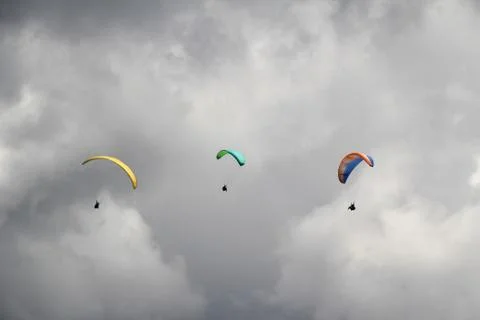 Three Paragliders Stock Photos