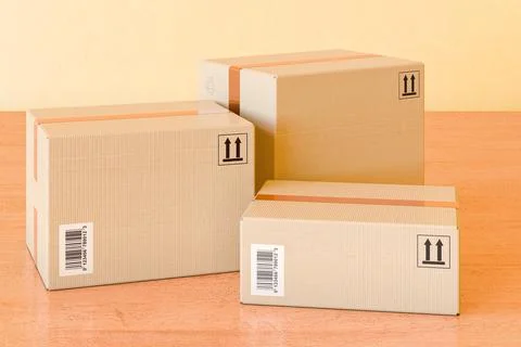 Three parcels. Shipping and logistics concept on the wooden table, 3D renderi Illustrazione stock