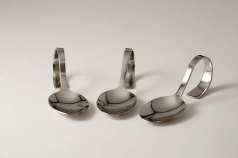 Three party spoons in a row 库存照片