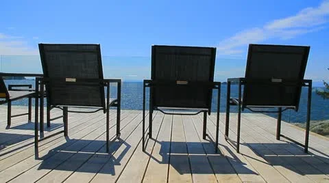 Three Patio Chairs Stock Footage 15532979