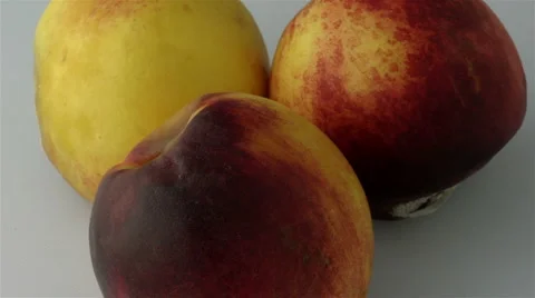 Three peaches decaying - 20 seconds Stock Footage 2974835