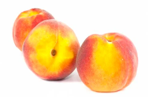 Three peaches Stock Photos