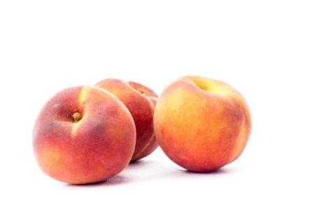 Three peaches Stock Photos