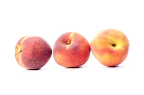 Three peaches Stock Photos