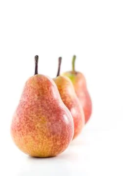 Three pears in a row Stock Photos