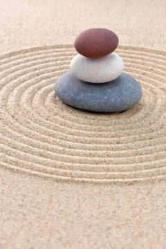 Three pebble stack zen garden Stock Photos