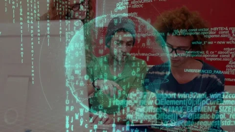 Three peers reading notebook and guiding typing while teal globe and code Stock Footage 329033883