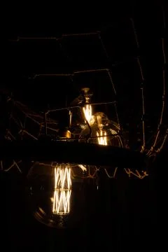 Three pendant burning lights for interior decoration. Foto stock