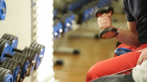 Three People lifting weights Stock Footage 1094779