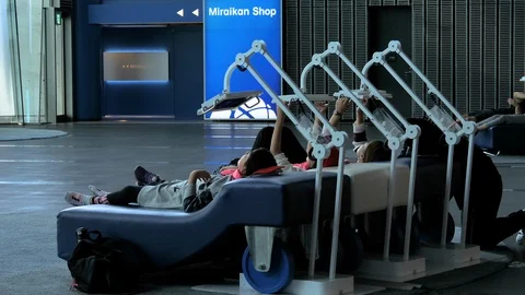 Three people lying on the couch with the ipad on it Stock Footage 120916661