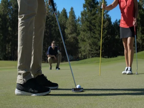 Three people playing golf 動画素材 76236411