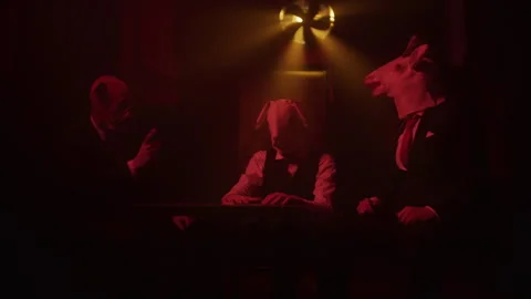 Three People Sitting and Playing cards in the club 库存影片 259050219
