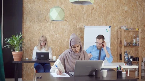 Three people working at pc in office. Stock Footage 107738269