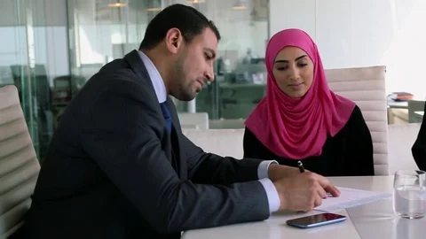 Three people working together in the office Stock Footage 70103631