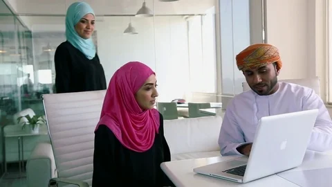 Three people working together in the office Stock Footage 70103886