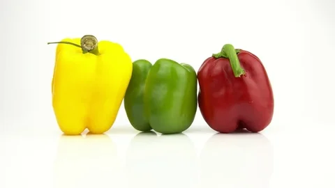 Three peppers on a white background Stock Footage 83225116
