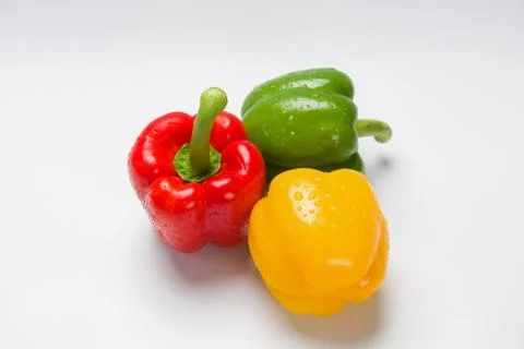 Three peppers on white background Stock-Fotos