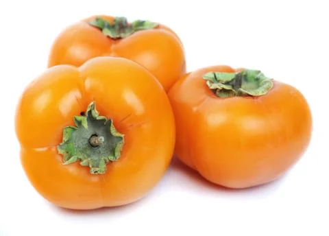 Three persimmon Stock Photos