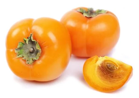 Three persimmon Stock Photos