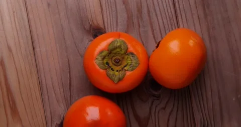 Three persimmons. Stock Footage 156275843
