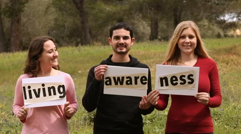 Three persons with self-made signboards with conceptual words Stock Footage 61861146