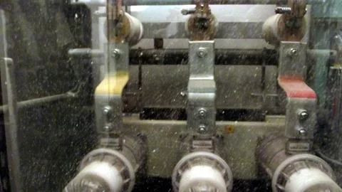 Three-phase Busbar in a Transparent Enclosure Stock Photos