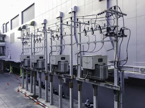 Three-phase transformer station supplying power to the supermarket Stock Photos