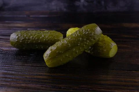 Three pickled cucumber Stock Photos