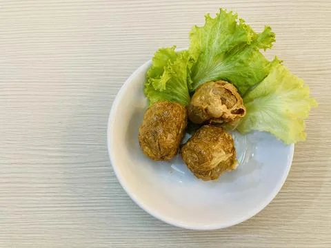 Three pieces of deep-fried crab meat rolls Stock Photos