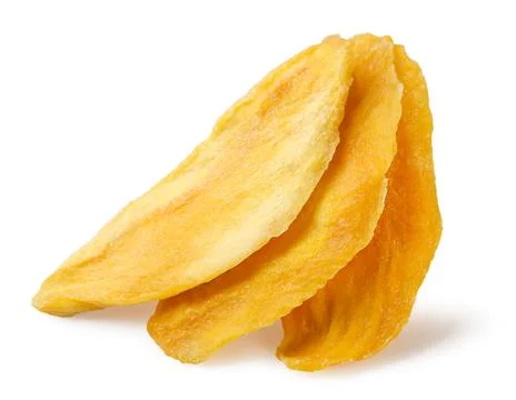 Three pieces of dried mango close-up on a white. Isolated Stock Photos