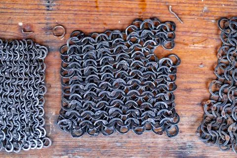 Three pieces of metal with a pattern of circles Stock Photos