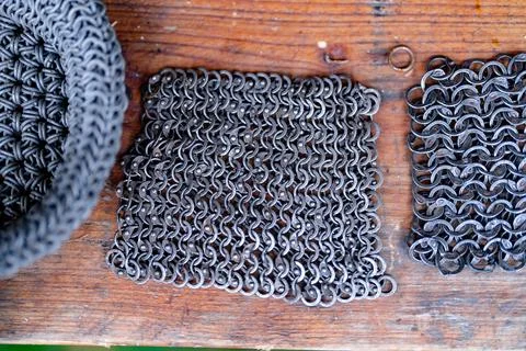 Three pieces of metal with a pattern on them Stock Photos