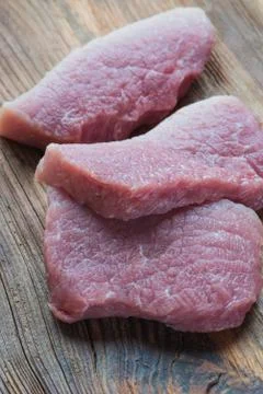 Three pieces of pork Stock Photos