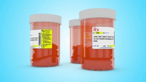 Three Pill Bottles Rotate in a Circle Loop Stock Footage 73044817